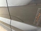 a sticker on the side of a car that has a ruler on it