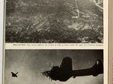 a book open to a picture of a plane flying over a city