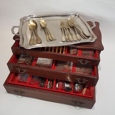 a tray with silverware in it and a tray with silverware in it