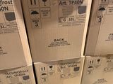 many boxes stacked on top of each other on the floor