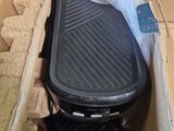 a box that has a grill inside of it