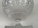 an image of a glass bowl on a white surface