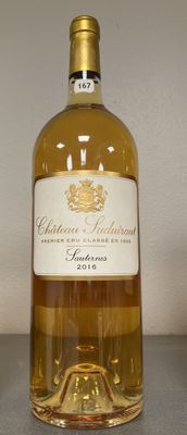 a bottle of wine that is sitting on a table