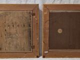 pair of antique wood picture frames with brown paint and a white background