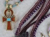 a lot of jewelry that is laying out on a table