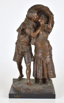 statue en bronze représentant deux femmes portant un panier sur la tête