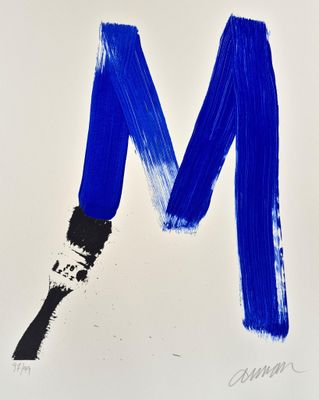 a painting of a letter m painted with blue paint on a white background