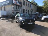 a car parked in front of a building in a parking lot