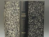 a black and white photo of a book with a black cover
