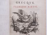 un vieux livre sur lequel figure l'image d'un oiseau dans un nid