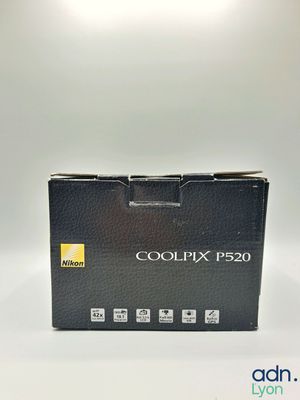 a close up of a box of a camera on a white surface