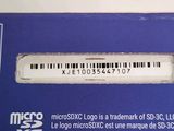 a blue box with a barcode on it that says microsoxclo is trademark sdc, llc