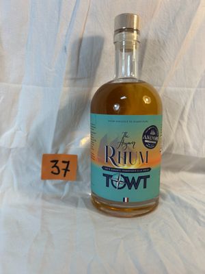 a bottle of rum that is sitting on a table