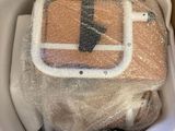 a box that has some kind of bag in it