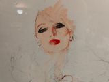 a drawing of a woman with a red lipstick on it