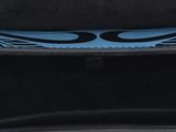 a knife in a case with a wooden handle