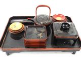 a picture of a tray with a tea set on it
