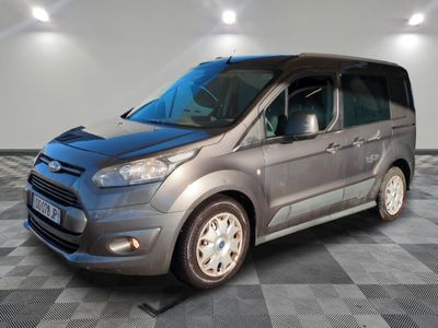 ford transit van parked on a checkered floor in a garage