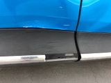 a close up of a car ' s door handle and door handle