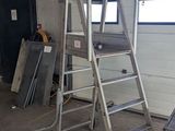 a ladder that is sitting in a garage