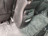 a picture of the inside of a car with the door open