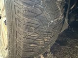 a close up of a tire on the ground