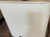 an image of a toaster sitting on a table