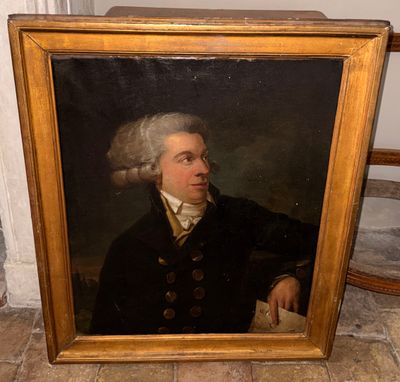 un tableau représentant un homme en manteau noir tenant un livre