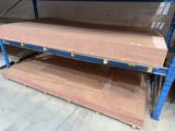 a shelf that has a lot of wood on it