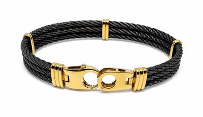 un bracelet en câble noir avec un fermoir doré