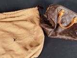 louis vuittoupe bag and pouch on a black background