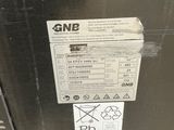 a metal box with a sticker on it