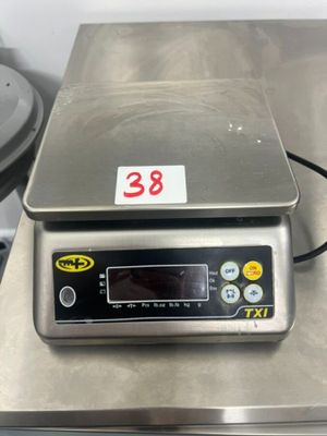 an image of a digital scale sitting on a table