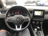 the interior of a car with a steering wheel, dashboard, and dash board
