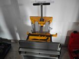 a machine that is sitting on the floor in a room