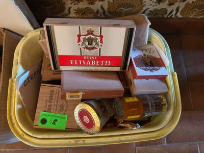 a yellow container filled with boxes and bottles of beer