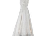 the back of a white wedding dress on a mannequin mannequin