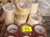 several rolls of tape sitting on top of a table next to other rolls of tape