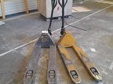 a forklift that is sitting in the middle of the floor