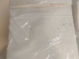 a bag of white paper sitting on a counter