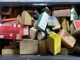 a bin full of boxes and boxes that are sitting on the floor