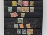 a picture of a display case with stamps on it