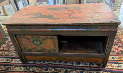 an old wooden table with a drawer on top of it