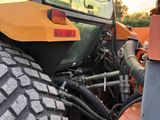 an image of a tractor with a big tire