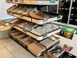 a large display of different types of food in a store
