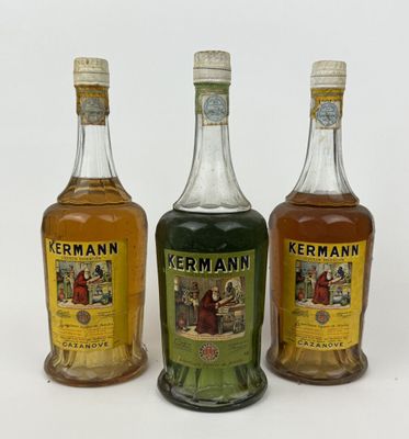 trois bouteilles d'alcools différents posées les unes à côté des autres