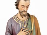 a statue of a man with a beard and a robe