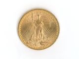 an image of a gold coin on a white surface