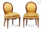 pair of louis xvi style carved walnut side chairs