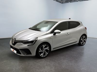 a silver car is parked in a white room with a black floor